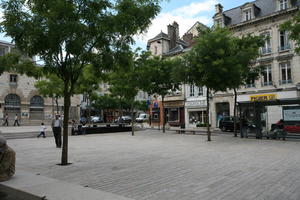 bench, Champagne-Ardenne, city, day, eye level view, France, pavement, square, summer, tree, Troyes, vegetation