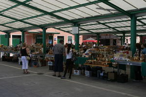 architecture, canopy, Croatia, day, eye level view, food, Istarska, man, market, natural light, object, people, shopping, spring, stall, sunny, woman