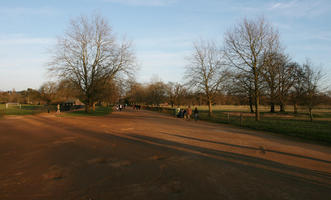 bright, dusk, England, eye level view, group, Oxford, park, path, people, The United Kingdom, tree, vegetation, winter