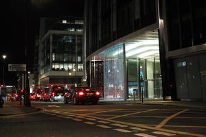 artificial lighting, car, city lights, England, eye level view, London, night, outdoor lighting, street, The United Kingdom