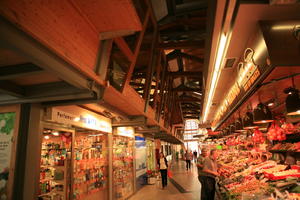 artificial lighting, Barcelona, Cataluña, day, direct sunlight, eye level view, market, retail, shopping centre, Spain, spring, sunny