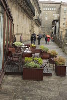 cafe, chair, day, eye level view, furniture, Galicia, overcast, potted plant, Santiago de Compostela, Spain