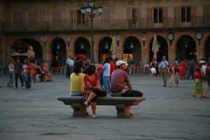 Castilla y Leon, casual, day, eye level view, group, people, plaza, Salamanca, sitting, Spain, summer, sunlight, sunny, sunshine