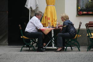 Austria, autumn, cafe, casual, couple, day, diffuse, diffused light, elderly, eye level view, Graz, natural light, people, sitting, Steiermark, street