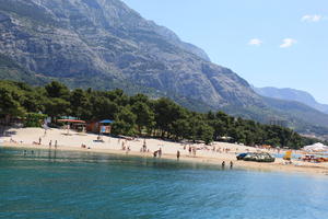 beach, boat, Croatia, day, eye level view, Makarska, mountain, people, seascape, Splitsko-Dalmatinska, summer, sunbathing, swimming, tree, vegetation