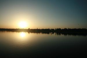 clear, dusk, East Timor, Egypt, Egypt, eye level view, river, river Nile, silhouette, sky, sun, sunset, vegetation