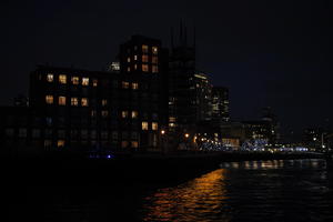 artificial lighting, building, city, city, city lights, cityscape, England, eye level view, London, night, river, riverbank, The United Kingdom, waterfront, winter