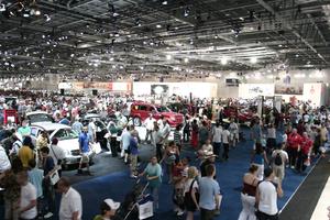 artificial lighting, ceiling, crowd, elevated, England, exhibition, interior, London, people, The United Kingdom