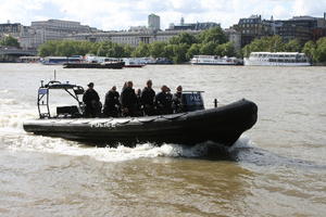 boat, day, England, eye level view, group, inflatable boat, London, male, man, people, policeman, river, standing, summer, sunny, The United Kingdom