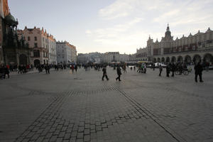 crowd, day, eye level view, Krakow, Malopolskie, pavement, people, Poland, shady, square, sunny, walking, winter