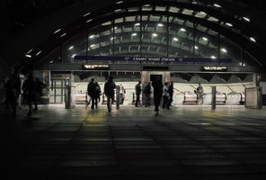 artificial lighting, England, eye level view, London, night, pavement, station, The United Kingdom