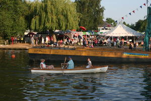 boat, broad-leaf tree, broad-leaved tree, canal, day, deciduous, England, eye level view, fair, group, outdoors, people, rowing, sitting, Stratford-Upon-Avon, summer, sunny, The United Kingdom, tree