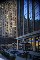 building, day, elevated, facade, lamppost, Manhattan, New York, people, sitting, skyscraper, street, summer, sunny, The United States, walking, woman