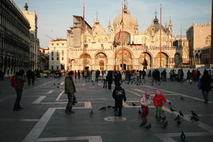 architecture, Basilica San Marco, bird, casual, cathedral, child, day, dusk, eye level view, group, Italia , people, Piazza San Marco, pidgeons, square, Veneto, Venice, winter