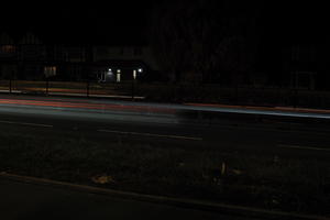 artificial lighting, car lights, city lights, England, evening, eye level view, London, night, outdoor lighting, road, The United Kingdom, urban, winter