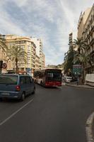 Alicante, bus, car, day, eye level view, natural light, Spain, street, sunny, Valenciana