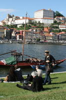 back, casual, day, direct sunlight, elevated, eye level view, group, people, Porto, Porto, Portugal, river, sitting, spring, sunny