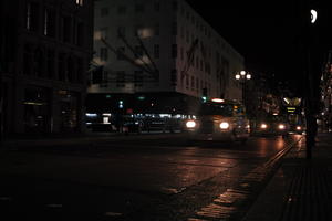 artificial lighting, car, city lights, England, eye level view, London, night, outdoor lighting, street, taxi, The United Kingdom