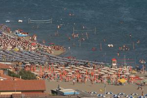 afternoon, bathing, beach, day, direct sunlight, elevated, Grosseto, Italia , natural light, people, summer, sunbathing, Toscana