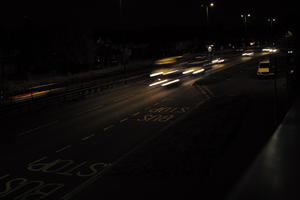 artificial lighting, car, car lights, city lights, elevated, England, evening, London, night, outdoor lighting, road, The United Kingdom, traffic, urban, winter