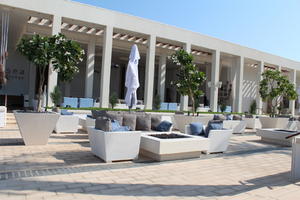 building, building, day, direct sunlight, Dubai, Dubayy, eye level view, furniture, hotel, hotel, natural light, parasol, plant, sunlight, sunny, sunshine, terrace, terrace, The United Arab Emirates, tree