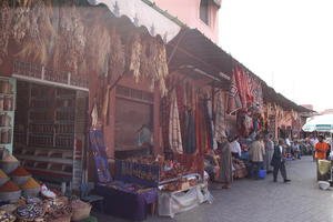 autumn, day, eye level view, group, market, Marrakech, Marrakesh, middleastern, Morocco, people, stall, sunny