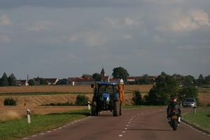 Bourgogne, car, crop, day, Dijon, eye level view, field, France, man, motorcycling, natural light, road, tractor, tree, village