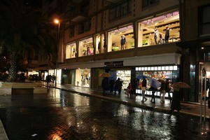 artificial lighting, Bari, eye level view, group, Italia , mannequin, night, object, people, Puglia, retail, shop, street, walking, winter, winter