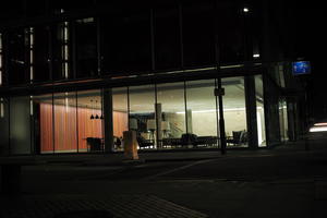 artificial lighting, building, England, eye level view, lobby, London, night, spring, street, The United Kingdom, urban