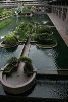 above, apartment, building, cloudy, day, England, garden, London, plant, pond, residential, The United Kingdom, vegetation