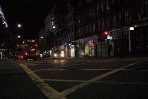 artificial lighting, city lights, England, eye level view, London, lowered, night, outdoor lighting, street, The United Kingdom