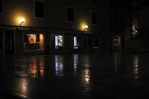 artificial lighting, building, city, Croatia, eye level view, night, pavement, pavement, paving, spring, street, wet, Zadar, Zadarska