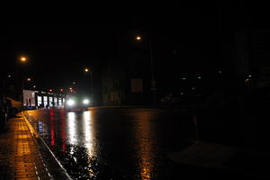 artificial lighting, city lights, eye level view, Kalisz, night, outdoor lighting, Poland, street, urban, wet, Wielkopolskie, winter