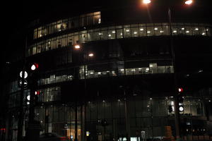 artificial lighting, city, city lights, England, eye level view, facade, London, night, office building, outdoor lighting, The United Kingdom, urban