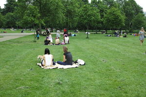 day, England, eye level view, grass, Hyde Park, London, overcast, park, people, sitting, spring, The United Kingdom, tree, vegetation