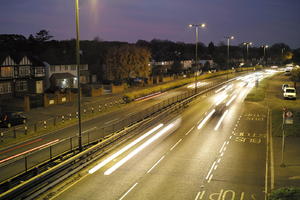 artificial lighting, car, car lights, city lights, elevated, England, evening, lamppost, London, night, outdoor lighting, road, The United Kingdom, traffic, urban, winter