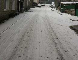 architecture, Blagoevgrad, Bulgaria, car, day, eye level view, house, overcast, road, snow, transport, winter