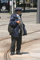 casual, day, direct sunlight, elderly, eye level view, male, man, Porto, Porto, Portugal, spring, standing, street, sunny