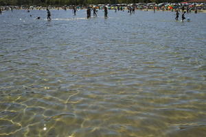 beach, Croatia, day, direct sunlight, eye level view, outdoors, people, standing, summer, sunlight, sunny, sunshine, swimming