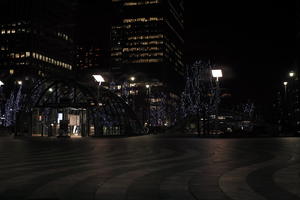 artificial lighting, building, building, city, cityscape, England, eye level view, London, night, paving, plaza, station, The United Kingdom, winter