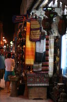 artificial lighting, autumn, clothing, Essaouira, eye level view, market, Morocco, object, souvenir, stall