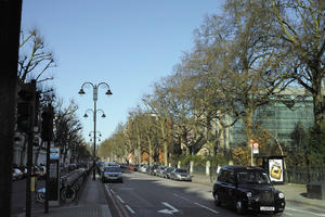 cab, car, day, England, eye level view, lamppost, London, street, sunny, taxi, The United Kingdom, winter