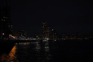 artificial lighting, building, city, city, city lights, cityscape, England, eye level view, London, night, river, riverbank, The United Kingdom, waterfront, winter