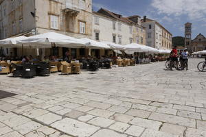 cafe, Croatia, day, eye level view, furniture, Hvar, pavement, Splitsko-Dalmatinska, summer, sunny, umbrella