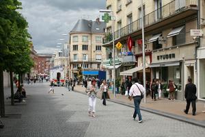 Amiens, day, eye level view, facade, France, group, lamppost, man, overcast, pavement, people, Picardie, retail, shop, shopping, sign, street, tree, walking, window, woman