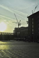 afternoon, cityscape, contre-jour, crane, England, eye level view, facade, London, pattern, paving, plaza, square, street, sun glare, sunset, The United Kingdom, urban