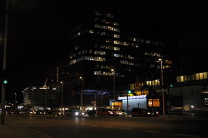 artificial lighting, building, car, city, city lights, England, eye level view, facade, Liverpool, night, outdoor lighting, street, The United Kingdom, traffic, urban