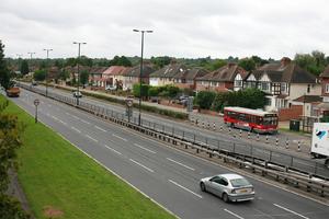 bus, car, day, elevated, England, grass, guardrail, London, natural light, road, The United Kingdom, vegetation