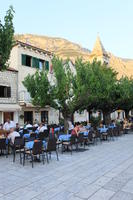 cafe, chair, Croatia, day, dusk, eye level view, furniture, group, Makarska, object, people, sitting, Splitsko-Dalmatinska, square, table, tree, vegetation