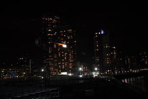 artificial lighting, building-site, city, city, city lights, cityscape, England, eye level view, housing block, London, night, The United Kingdom, winter